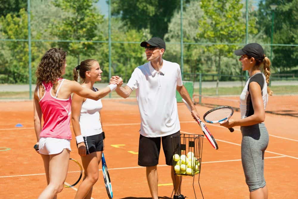 Tennis Workout clinic with tennis instructor and 3 pretty ladies