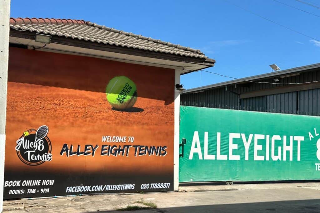 Alley8 Tennis Club entrance gate in Vientiane, Laos.