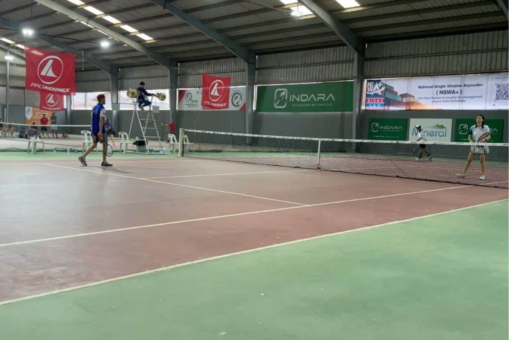 Anothai sporting club indoor, covered tennis courts in Vientiane, Laos during a tennis tournament in December 2024.