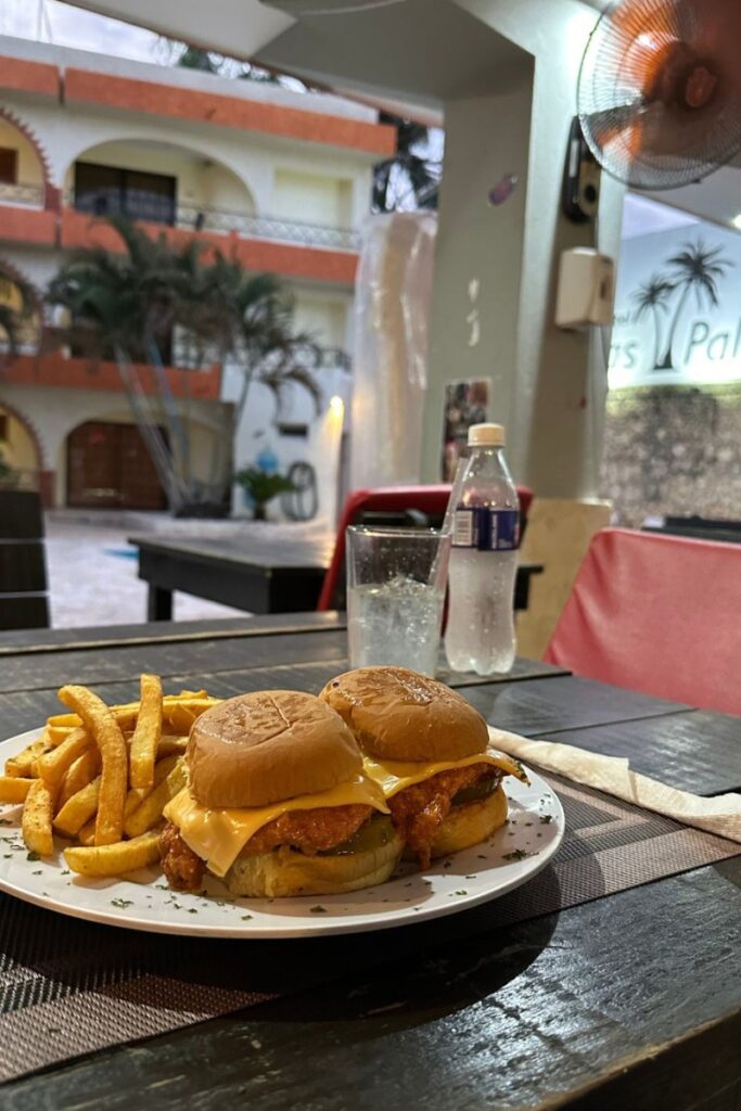 Buffalo chicken sliders dish at Wings and Waffle in Sosua, Dominican Republic, overlooking the pool at Las Palmeras Hotel.