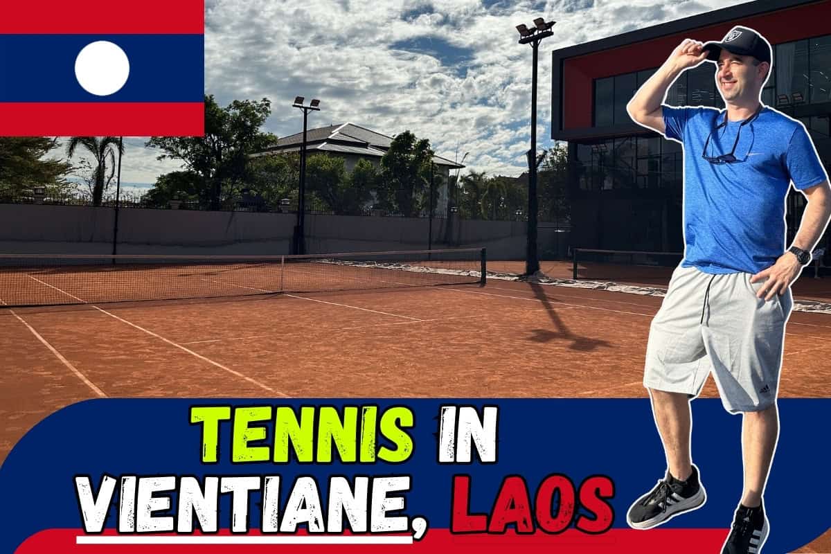 Featured image for article guide for visitors wanting to play tennis in Vientiane, Laos. Image is Eric Claggett overlooking a red clay court in Laos, with Laos flag, and text "Tennis in Vientiane, Laos."