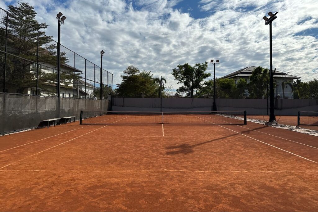 Vasy Sports Center beautiful red clay tennis courts (2), in Vientiane Laos.