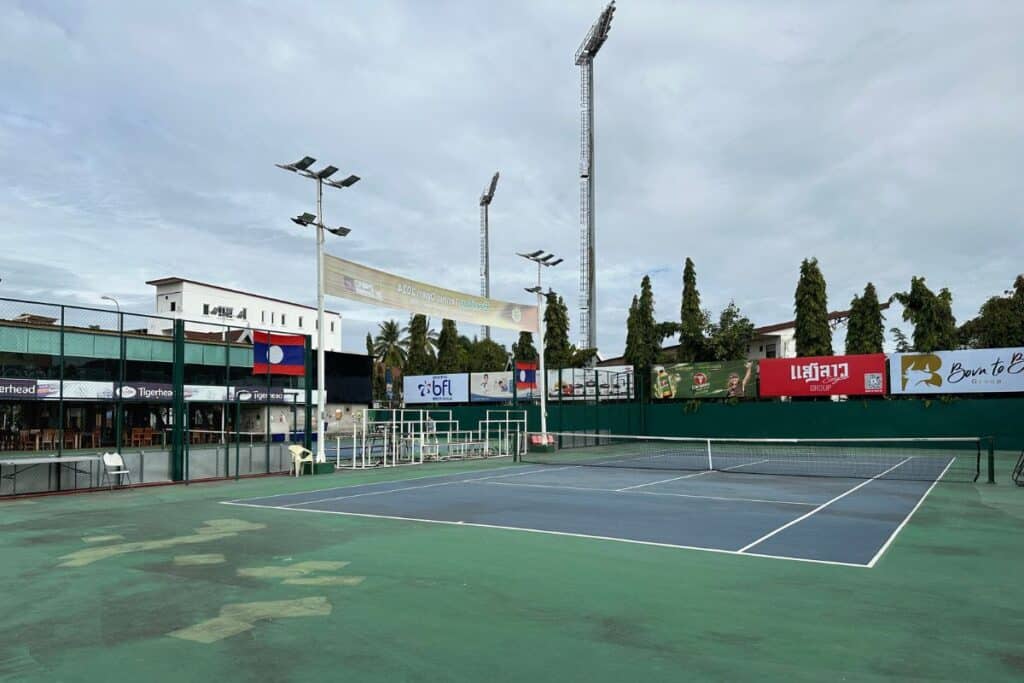 Vientiane tennis club photo of the two tennis hardcourts on a cloudy December day.