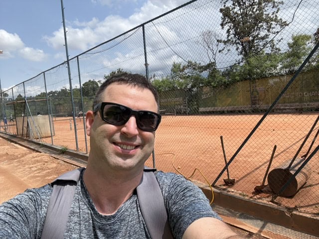 Nyarutarama Sports Centre tennis courts in Kigali, Rwanda -American visitor selfie.
