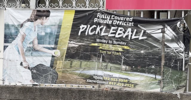 Advertisement for pickleball in Georgetown, Penang, Malaysia.