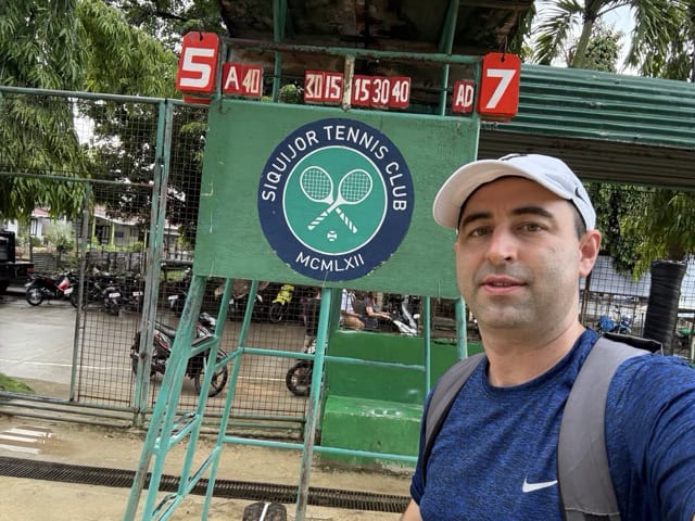 Eric Claggett from Primal Tennis visiting the Siquijor Island Tennis court in the philippines.